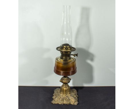 A cast based and glass oil lamp