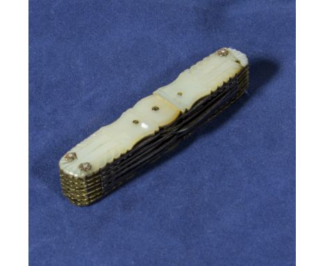 A multi blade mother of pearl knife
