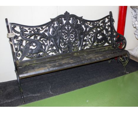 A cast iron garden bench