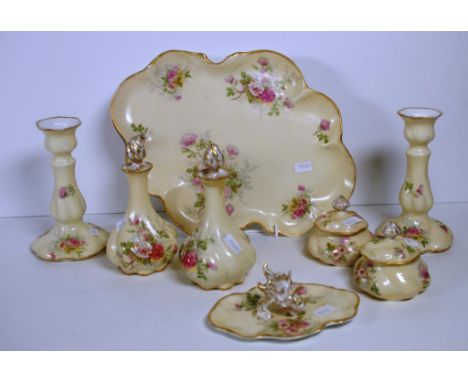 Limoges France eight piece dressing table set to include 2 candle sticks, 2 perfume bottles, 2 lidded trinket boxes, a ring h