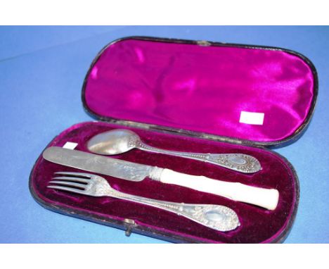 Cased Victorian three piece silver christening set including ivory handle knife, Edinburgh 1867 (?), makers HW & Co (export o