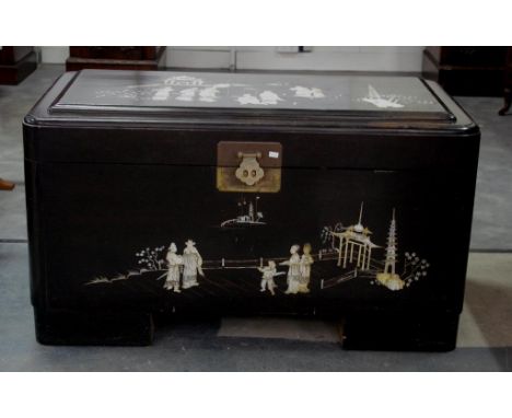 Japanese ebonised inlaid MoP trunk inlaid Mother of Pearl court scene decoration to lid and front. Circa 1950's. Length 102cm