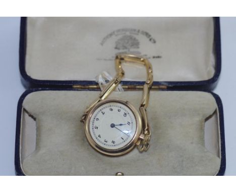 Boxed vintage 10ct gold cased fob style wristwatch by A.W.C. Co and 10ct band, weight: approx 18.55 grams