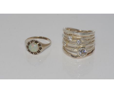 Silver and solid opal ring size: J-K/5 and another ring marked 925