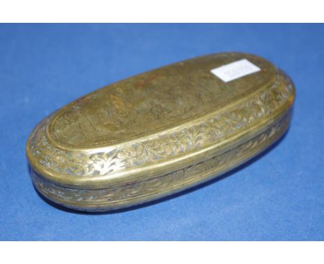 Vintage Dutch brass tobacco box oval shape, with engraved classical scenes to lid and base. Length 13cms approx.