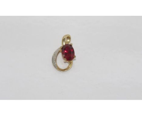 9ct gold, ruby and diamond pendant weight: approx 0.87 grams