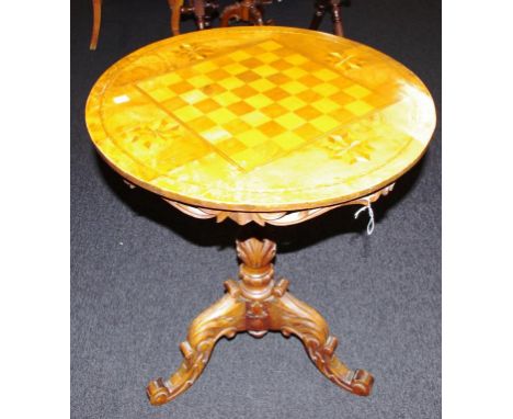 Antique tilt top chess table with marquetry top & ornate carved tripod legs, 60cm diameter, 74cm high approx.