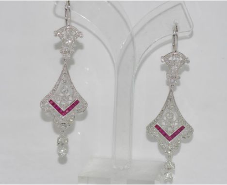 18ct white gold, diamond & ruby earrings 108 diamonds TDW=1.22ct,  18 princess cut rubies=71pts, =weight: approx 8.53 grams