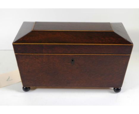 Regency beefwood tea caddy with brass ring handles and interior of satinwood with central mixing bowl. Length 30cms approx He