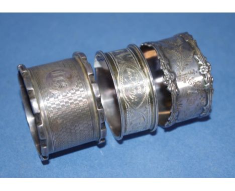 Three various vintage sterling silver napkin rings including Birmingham 1909, 1925 (monogrammed,) & 1910 (monogrammed). Weigh