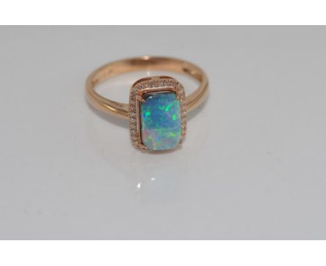 14ct rose gold and black opal ring weight: approx 2.43 grams, size: N-O/7