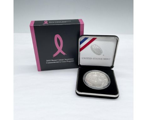 Commemorative Silver Dollar Uncirculated Coin. The obverse side features two women. The older woman has her hands on her ches