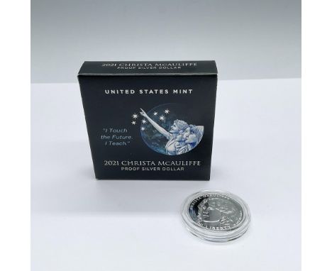 A commemorative silver dollar honoring Christa McAuliffe, an American teacher and astronaut who lost her life on the Space Sh