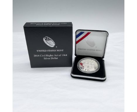 1oz silver commemorative from Philadelphia Mint in US Mint Packaging. The obverse design depicts three people holding hands a
