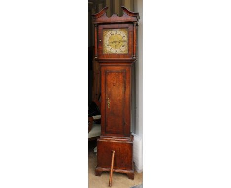 Hutchinson, Worksop, an eight-day oak longcase clock, having silvered chapter ring on brass dial with ornate spandrels, the h