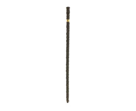 An Irish walking stick, carved with three crowned harps over shamrock, with brass collar. 90cm highCondition report: Ferrule 
