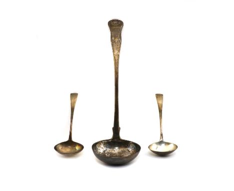 Three silver ladles, the Scottish soup ladle with hour glass and shell handle, by Andrew Wilkie, Edinburgh 1819, the pair of 