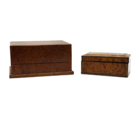 An amboyna and boxwood strung box, early 20th century, the hinged lid enclosing a two-division interior compartment, above a 