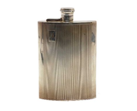 An Elizabeth II silver hip flask, maker's initials 'FBC', Birmingham 1962, of curved rectangular form, with engine turned dec