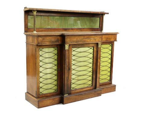 A Regency rosewood breakfront chiffonier, the quarter upstand with brass Corinthian columns above three frieze drawers and cu