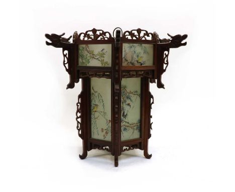 A Chinese hexagonal carved wood and painted glass lantern, 20th century, 34cm diameter, 39cm highCondition report: Some knock