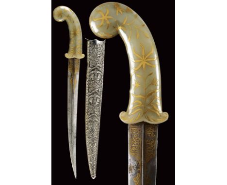 dating: Second half of the 19th Century provenance: India, Solid, slightly curved double-edged blade with thin rib at the cen