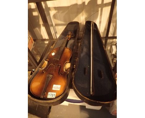 Antique violin with two piece back in wooden coffin case with bow