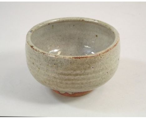 KENNETH QUICK. A footed tea bowl by Kenneth Quick. Personal mark. Diameter 11cm. Height 7cm.