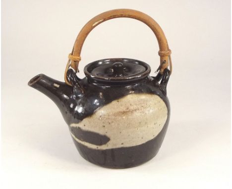 ALAN BROUGH An Alan Brough (Newlyn Pottery) cane handled teapot. Personal mark.