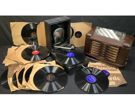 A Phillips Bakelite radio receiver; a Decca portable table top gramophone, number A23318, with assorted gramophone records (3