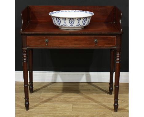 A George IV mahogany washstand, three-quarter gallery, rectangular top outlined with satinwood banding and boxwood and ebony 