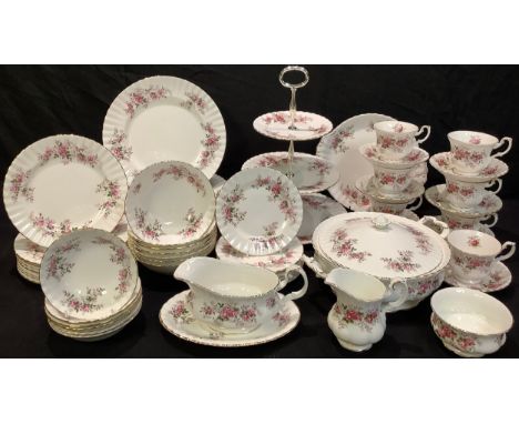 A Royal Albert Lavender Rose pattern dinner and tea service, comprising cake plate, three tier cake stand, milk and sugar, ei