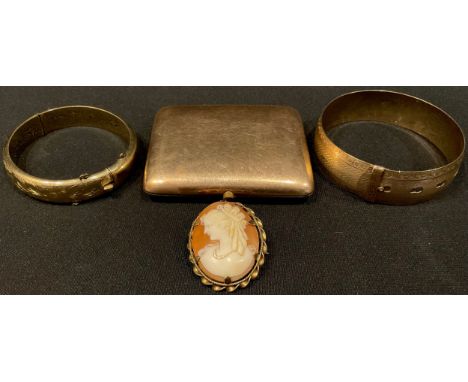 A gold plated cigarette case; a rolled gold bangle; another bangle; a cameo brooch (4) 