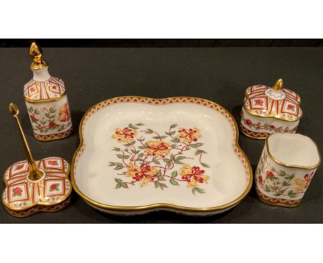 A Royal Crown Derby Honeysuckle pattern dressing table set, comprising scent bottle, trinket pot and cover, ring stand and ca