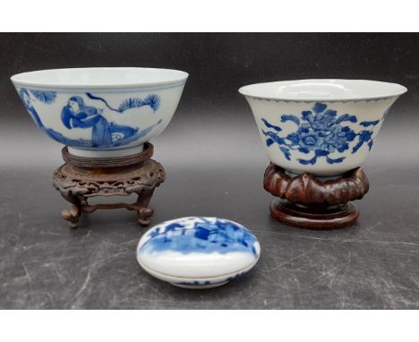 A collection of Qing dynasty Chinese blue and white porcelain. Including a round seal dish decorated with figures and two blu