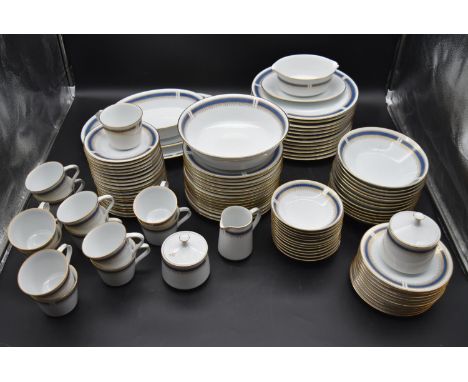 A late 19th century Japanese Noritake dinner service for fourteen. To include two serving dishes, two serving bowls, fourteen