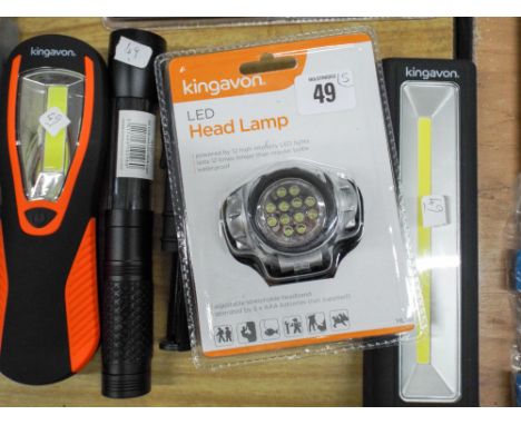 Four assorted torches and lamps and an LED headlamp 
