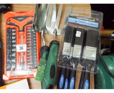 A new T-handled screwdriver set, a 5 piece paint brush set and a stainless steel garden hand trowel and fork 