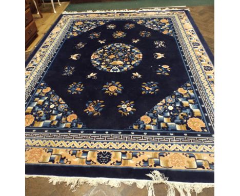 A superb blue and embossed patterned Chinese carpet approx 12'x9'  in excellent condition