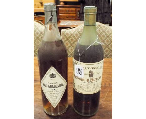A bottle of Hedges & Butler Cognac 1865 and a bottle Bas Almanac 1920 Berry Bros & Rudd Ltd
