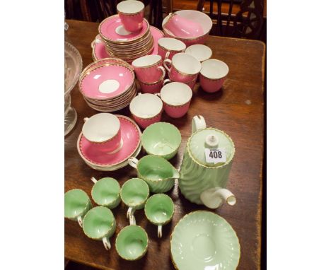 Part pink and gilt bordered tea set and a Minion's green coffee service 