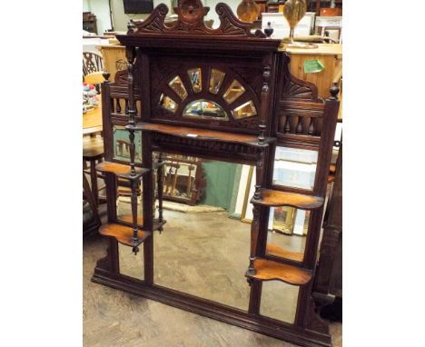 An Edwardian over mantle mirror with trinket shelves 