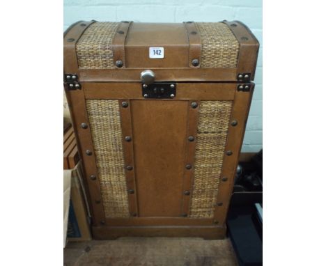 A dome top leather effect trunk 