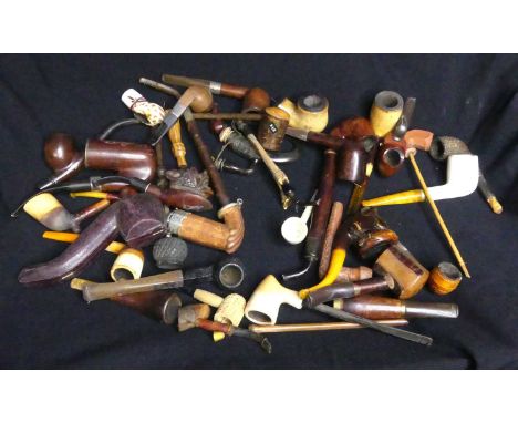 A South Africa Boer war pipe for the Welsh Guards dated 1899,1900 and 1901 together with a meerschaum pipe carved in the form