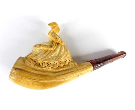 A 19th century meerschaum pipe, the bowl carved as a victorian naughty erotic lady half in dress and half nude 9cm, together 