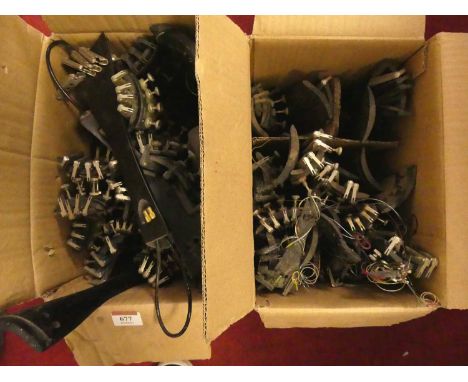 Two boxes of cello string instruments ebony tail piece bridges