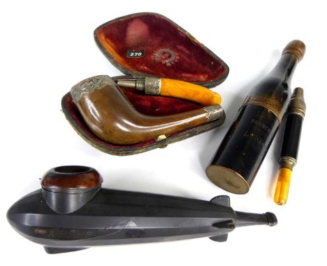 A cased two piece pipe distrubuted by Hurlingham B M with silver tip and collar in fitted tooled leather case, together with 