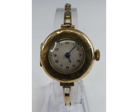 A lady's vintage 18ct gold cased manual wind wristwatch, on 18ct gold expanding link bracelet, 18.7g