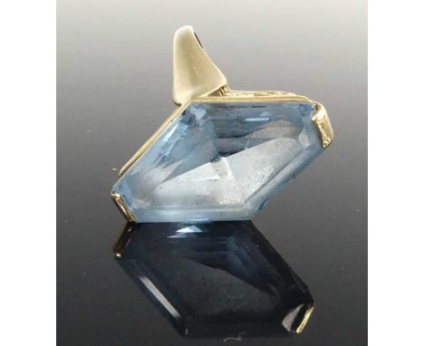 A modern 9ct gold blue topaz set dress ring, the lozenge cut topaz in a raised claw setting measuring approx 24 x 16mm, size 