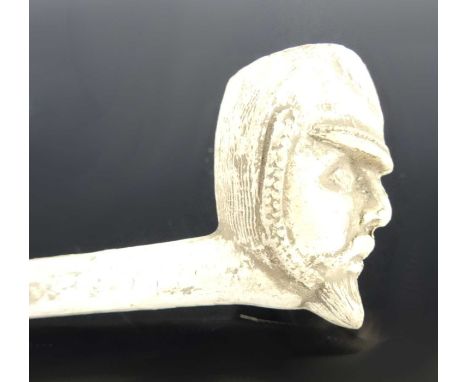 An early 20th century clay pipe depicting Baden Powell together with an example for General Gordon, a French gunner, shaking 
